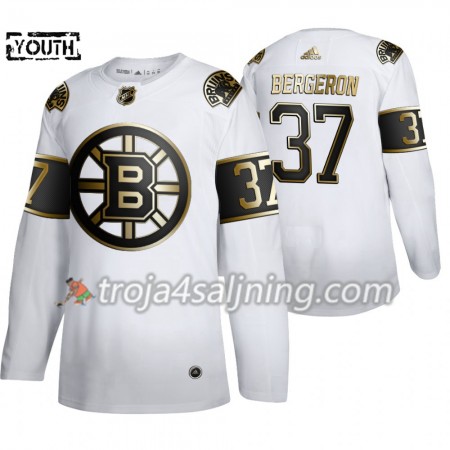 Boston Bruins tröja Patrice Bergeron 37 2019-2020 Adidas Golden Edition Vit Authentic - NHL Tröjor Barn Boston Bruins tröja Patrice Bergeron 37 2019-2020 Adidas Golden Edition Vit Authentic - NHL Tröjor Barn